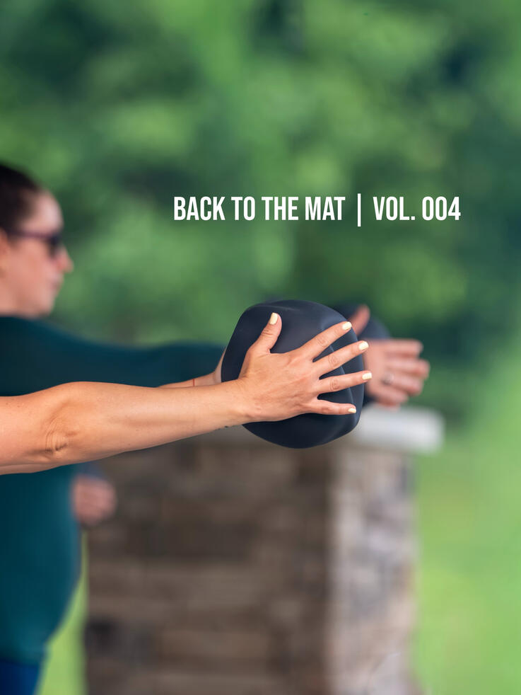 Working with the Pilates ball BACK TO THE MAT Vol. 004 Class beneath the Essex County gazebo at Brookdale Park in Bloomfield New Jersey.