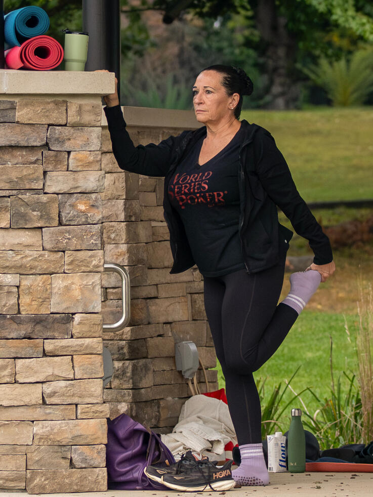 Stretching Participant performing a quad stretch.