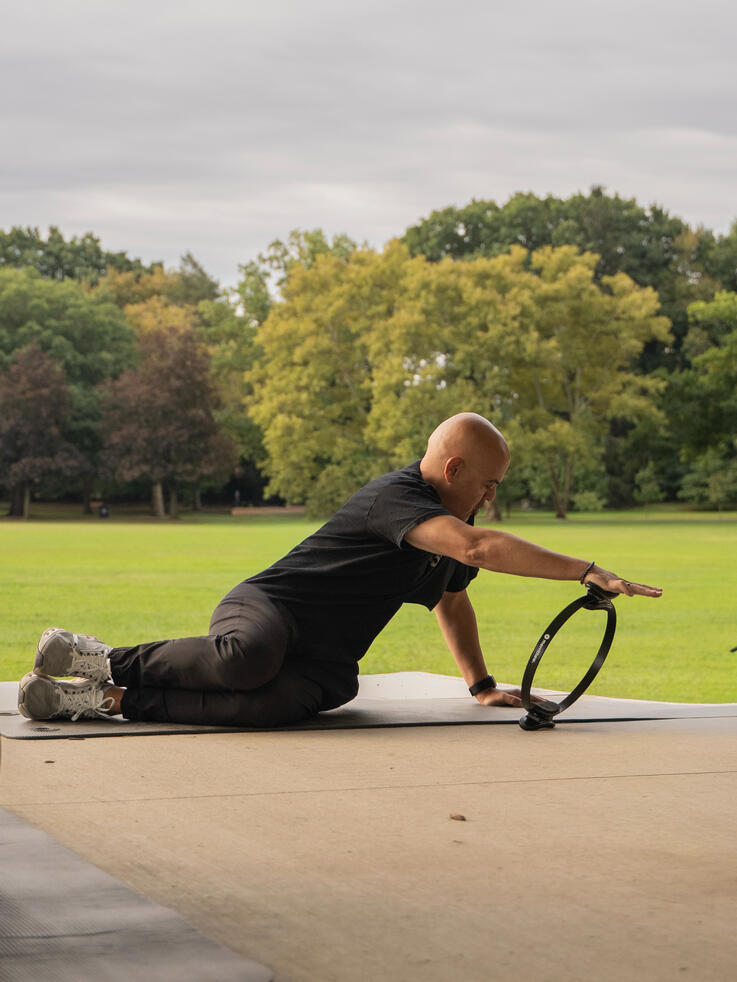 Rotational Movement Instructor demonstrating lateral and rotational movement using the ring.